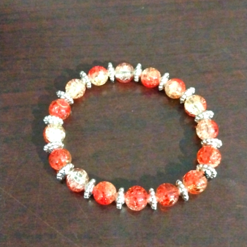 #015 Handmade set of 2 crackle glass bead bracelets orangish reddish color.